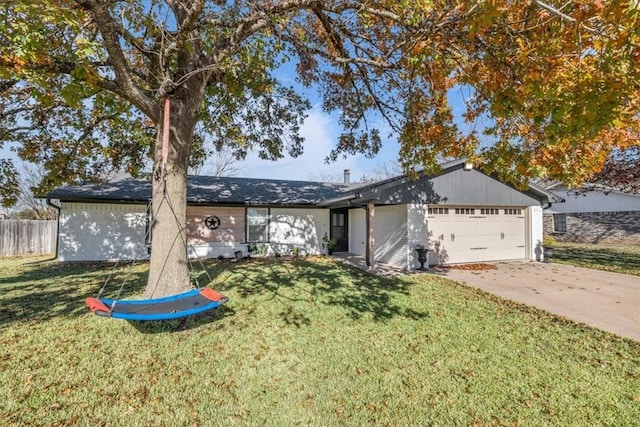 ranch-style house with a garage and a front yard