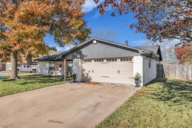 single story home with a front lawn and a garage