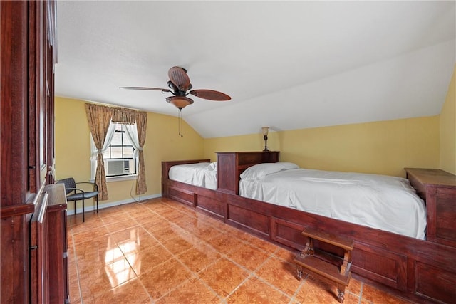 tiled bedroom featuring ceiling fan and lofted ceiling