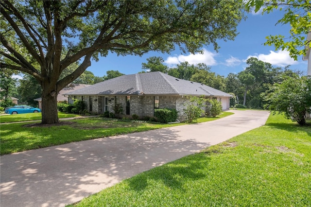 view of side of property featuring a yard