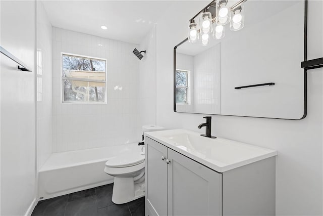 full bathroom with tile patterned flooring, a healthy amount of sunlight, vanity, and toilet