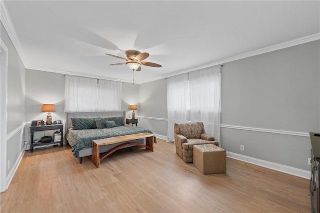 bedroom with ceiling fan, ornamental molding, and multiple windows