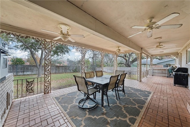 view of patio with ceiling fan