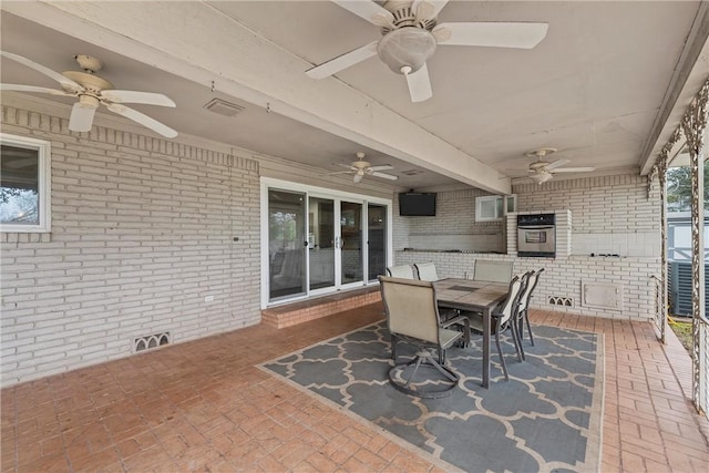 view of patio featuring central AC