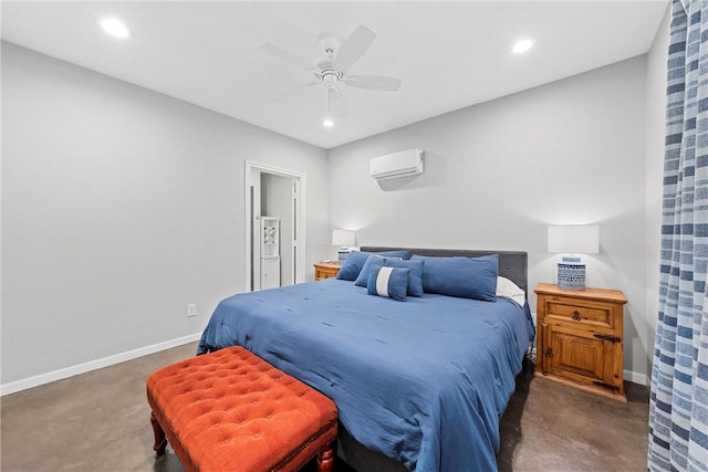 bedroom featuring ceiling fan and a wall mounted air conditioner