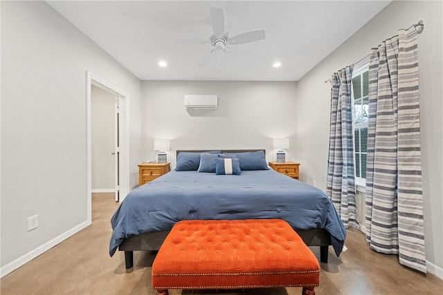 bedroom with a wall mounted AC and ceiling fan