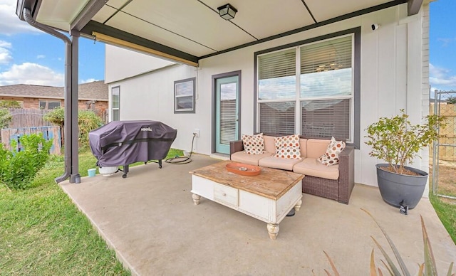 view of patio with a grill and outdoor lounge area