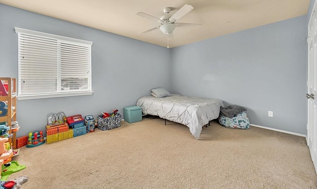 carpeted bedroom featuring ceiling fan