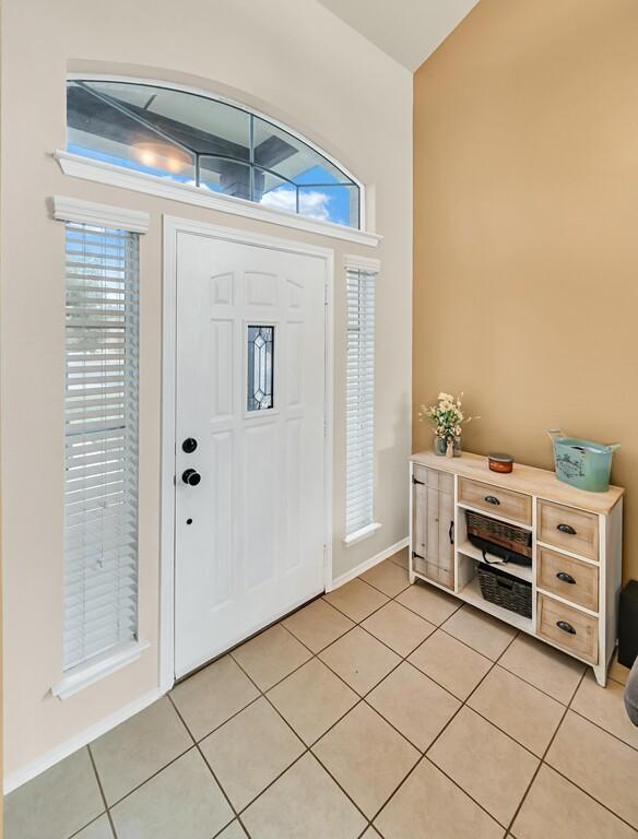 view of tiled foyer entrance