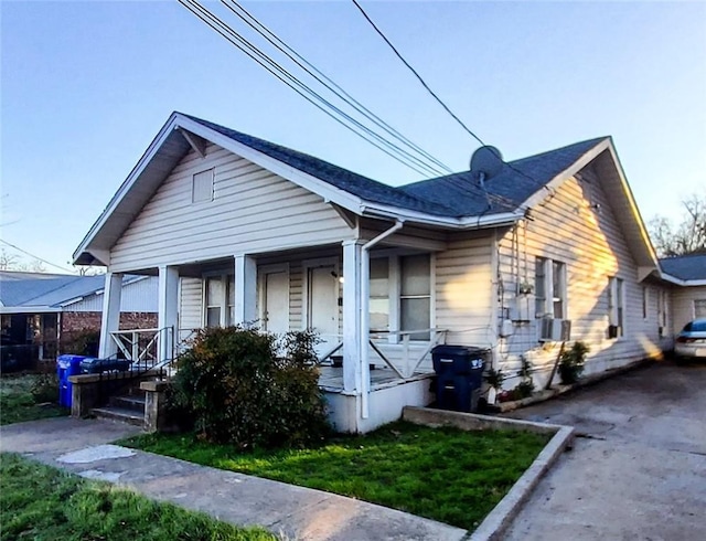 bungalow-style home featuring covered porch