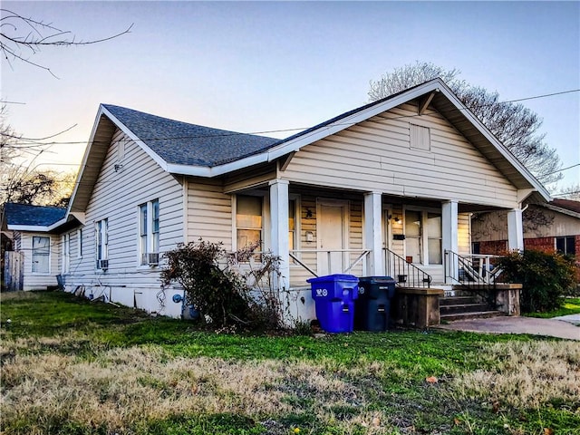 bungalow-style house featuring covered porch