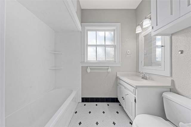 full bathroom featuring shower / bathtub combination, vanity, and toilet