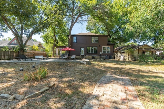 rear view of house with a patio area