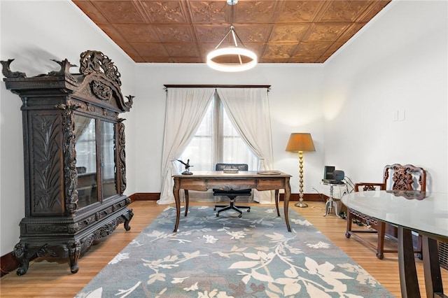 office area with hardwood / wood-style floors