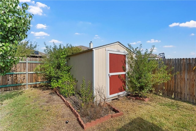 view of outdoor structure featuring a yard