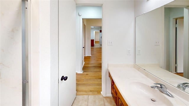 bathroom featuring vanity and tile patterned flooring