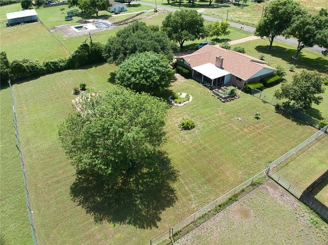 birds eye view of property featuring a rural view