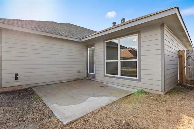 rear view of house featuring a patio area