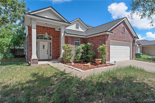 view of front of house with a front lawn and a garage