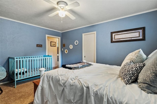 bedroom featuring ceiling fan, ornamental molding, and carpet flooring