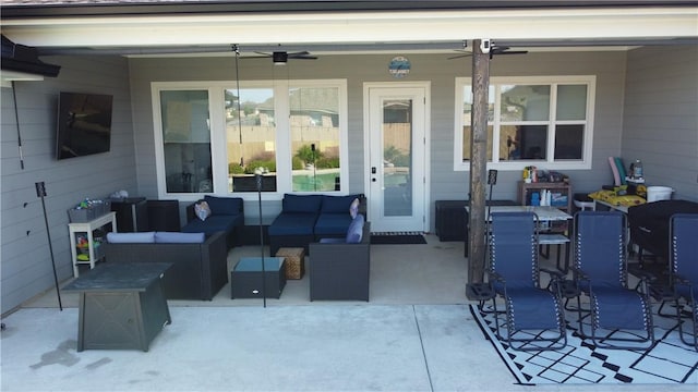 view of patio featuring ceiling fan and an outdoor living space