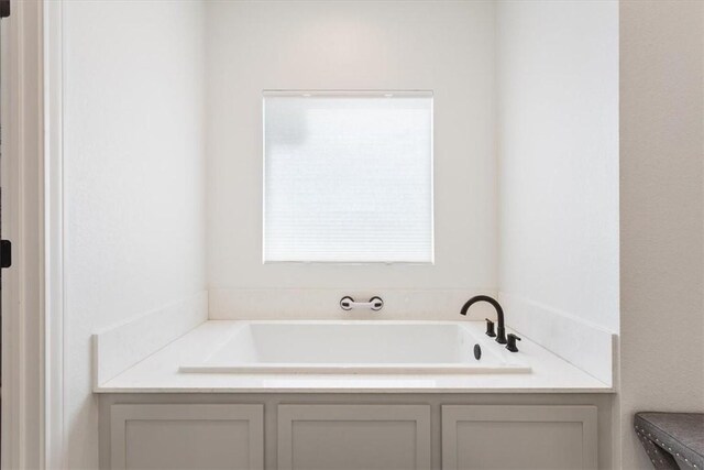 full bathroom featuring a bath, recessed lighting, vanity, and tile patterned floors