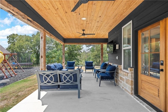 view of patio / terrace with a playground, ceiling fan, and an outdoor hangout area