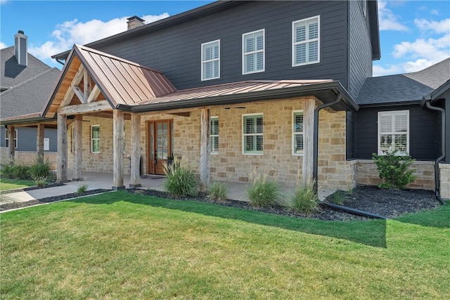 view of property featuring a front yard