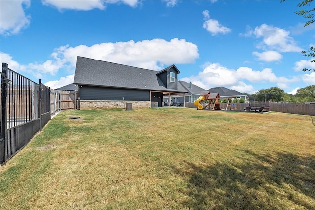 view of yard with a playground