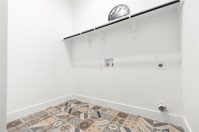 washroom with tile patterned floors, washer hookup, and hookup for an electric dryer