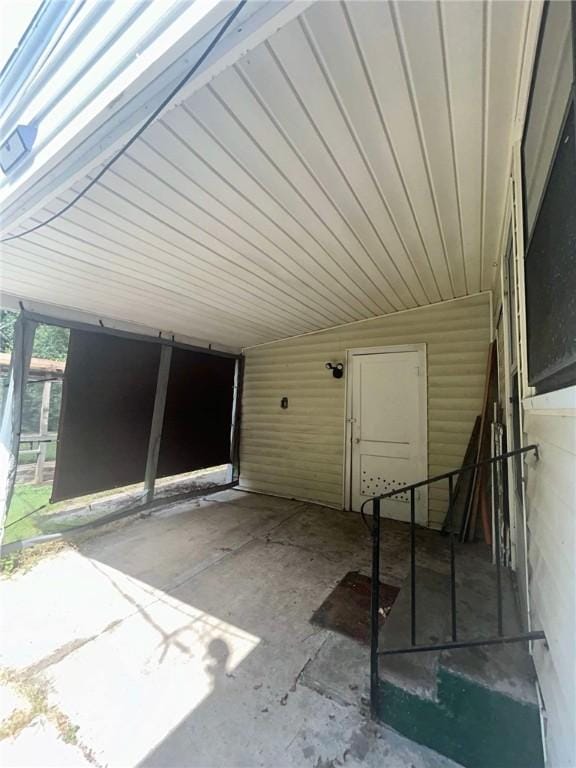 view of patio / terrace featuring a carport