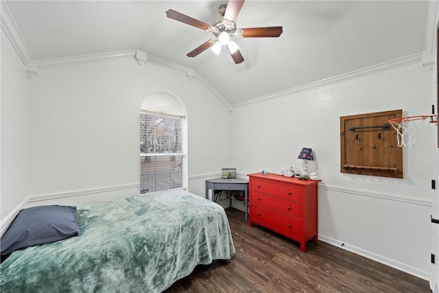 bedroom with ornamental molding, vaulted ceiling, ceiling fan, and dark wood-type flooring