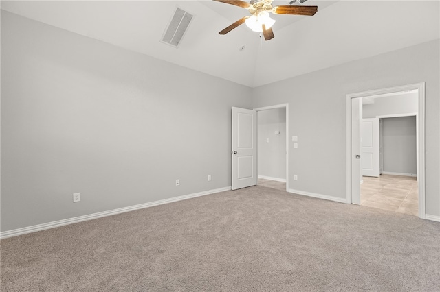 unfurnished bedroom with ceiling fan, light carpet, and high vaulted ceiling