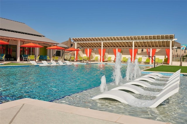 view of swimming pool featuring pool water feature