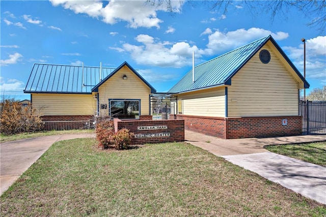 exterior space with a front yard