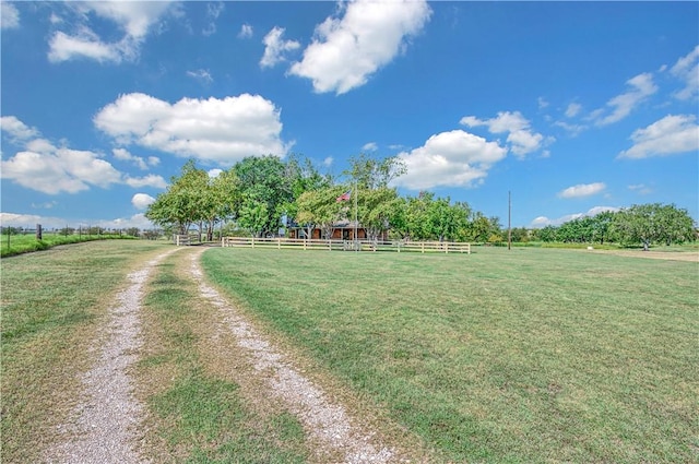 view of yard with a rural view