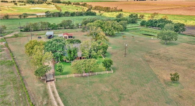 birds eye view of property with a rural view