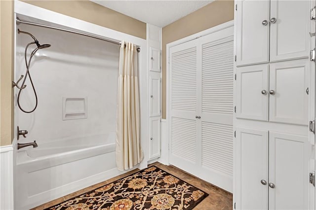 bathroom featuring shower / bath combination with curtain