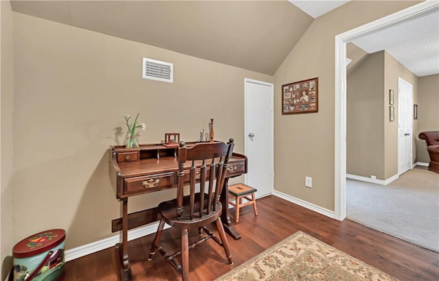 office space with hardwood / wood-style floors and vaulted ceiling