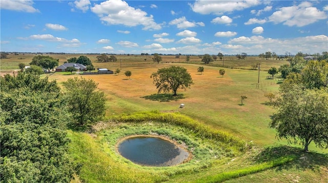 bird's eye view with a rural view and a water view