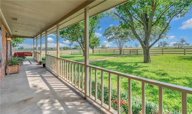 balcony with a porch and a rural view