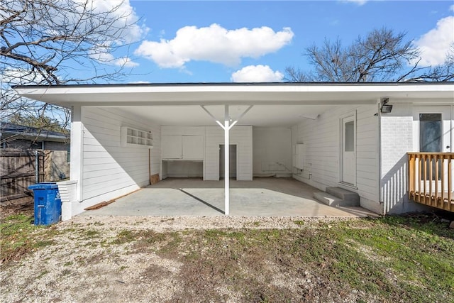 view of parking with a carport