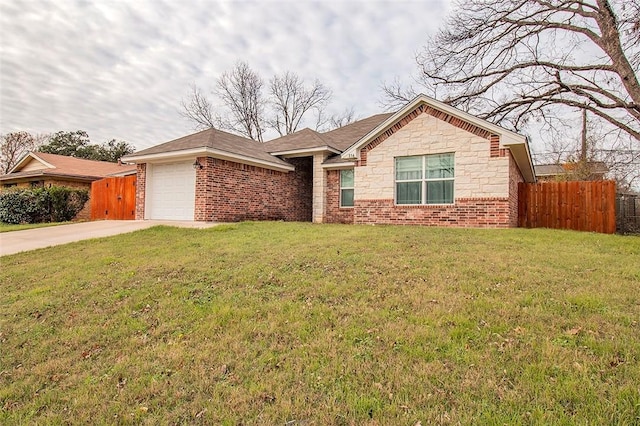 ranch-style home featuring a front yard and a garage