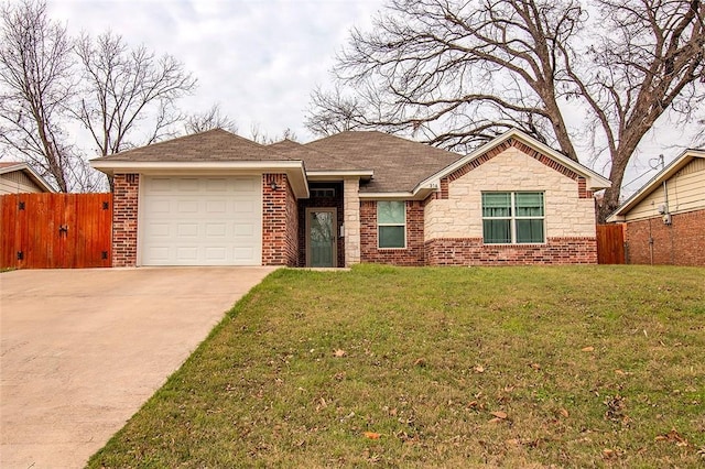 single story home featuring a front yard and a garage