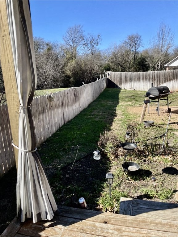 view of yard featuring a deck