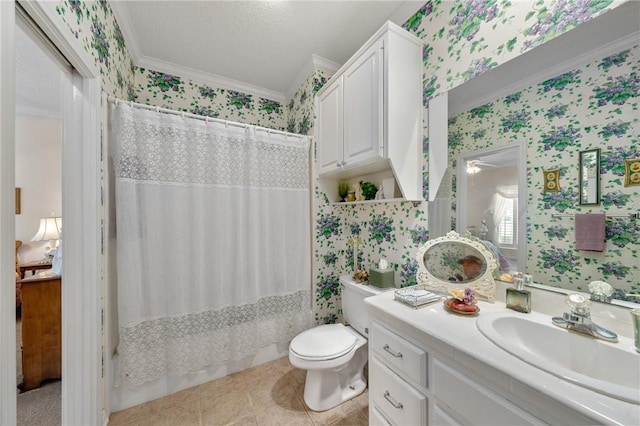 full bathroom featuring tile patterned floors, vanity, shower / tub combo with curtain, crown molding, and toilet