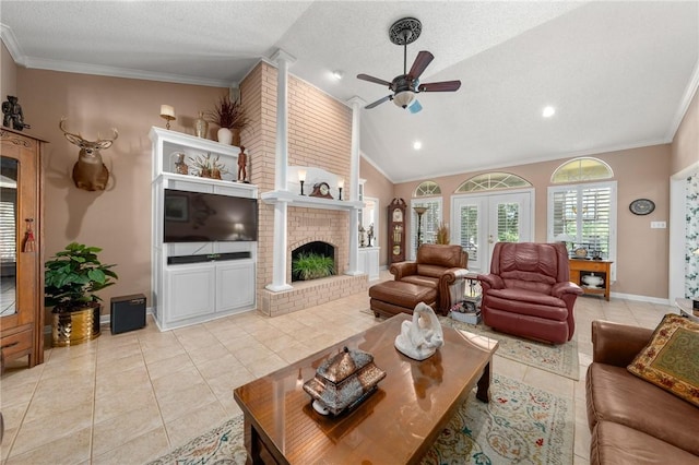 living room with crown molding, ceiling fan, and lofted ceiling