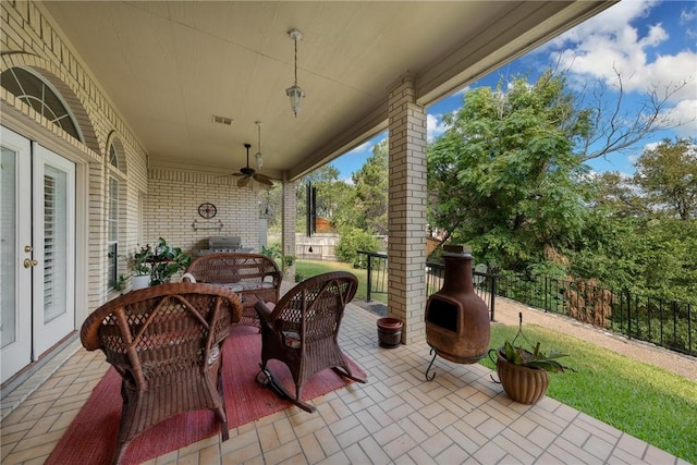 view of patio with ceiling fan