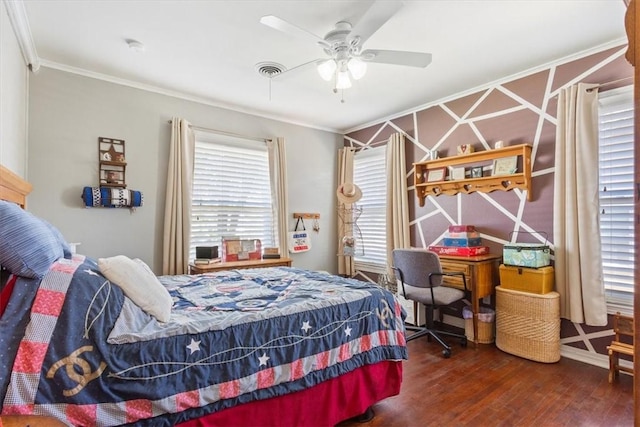 bedroom featuring ceiling fan, dark hardwood / wood-style flooring, and crown molding