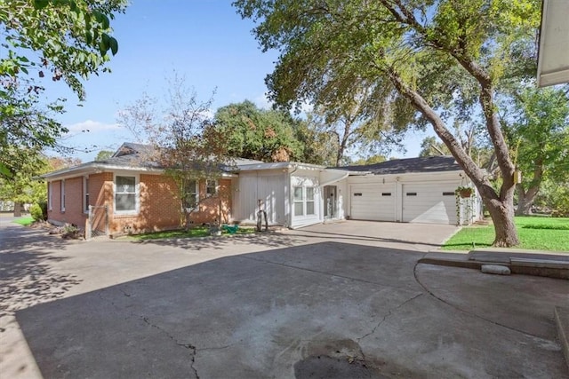 ranch-style home with a garage